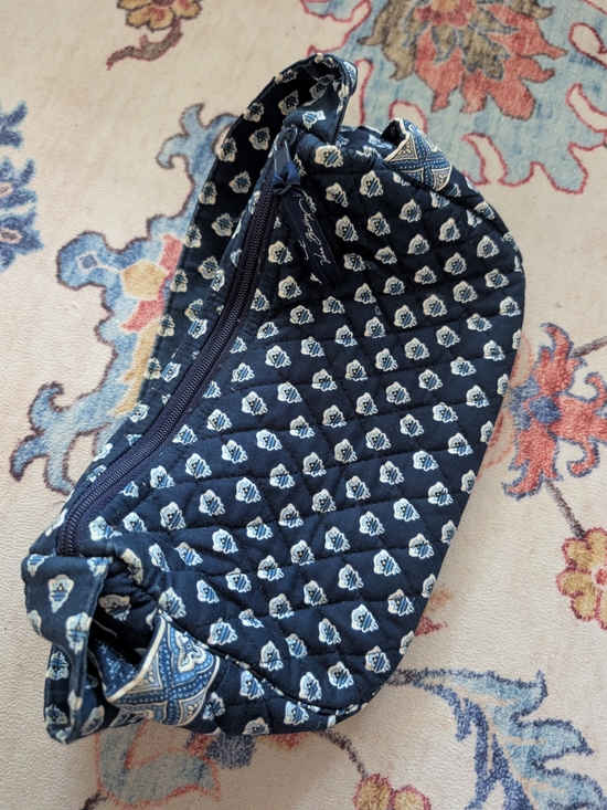 Vera Bradley Handbags - Vera Bradley Navy Quilted Cosmetic Pouch with White Floral Motif